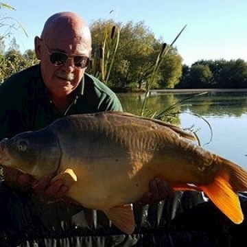 Carp (23lbs 8oz ) caught by Mick Cooper at  France.