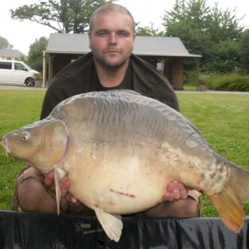 Carp (42lbs 7oz ) caught by Jason Cooper at  France.