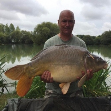 Carp (29lbs 4oz ) caught by Mick Lucas at  France.