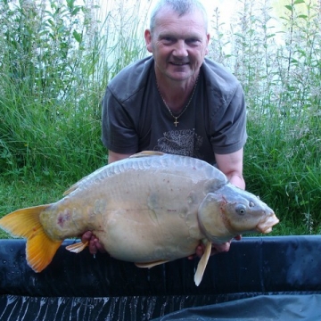 Carp (32lbs 8oz ) caught by Andy Dearnley at  France.