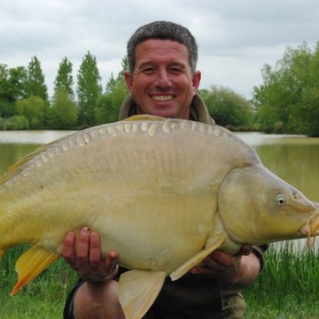 Carp (31lbs 12oz ) caught by Barry Plummer at  France.