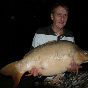 Carp (34lbs 11oz ) caught by Graham Burn at  France.