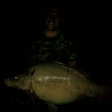 Carp (40lbs 4oz ) caught by Jeanette Callow (held by Dave) at  France.