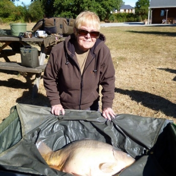 Carp (34lbs 8oz ) caught by Jenny Meider at  France.