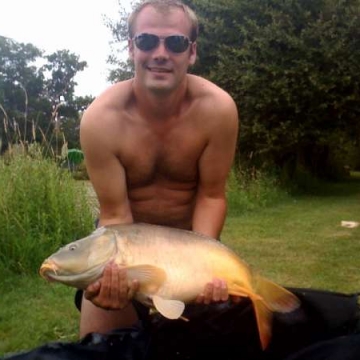 Carp (24lbs 7oz ) caught by Jonathan Fishburn at  France.