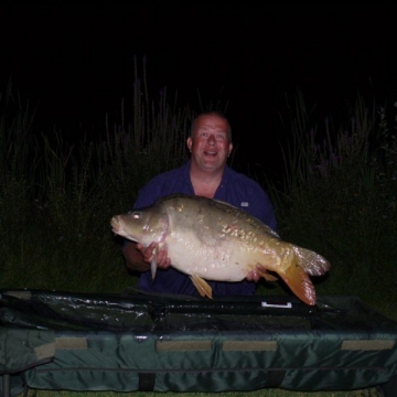 Carp (30lbs 8oz ) caught by Minne de Swart at  France.