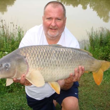 Carp (24lbs 12oz ) caught by Reg Miller at  France.