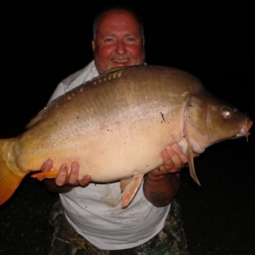 Carp (27lbs 8oz ) caught by Reg Miller at  France.