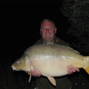 Carp (27lbs 10oz ) caught by Simon at  France.