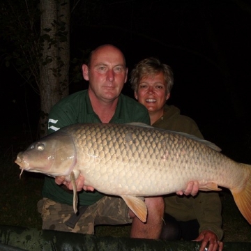 Carp (29lbs 6oz ) caught by Terri Morgan (held by Waine) at  France.