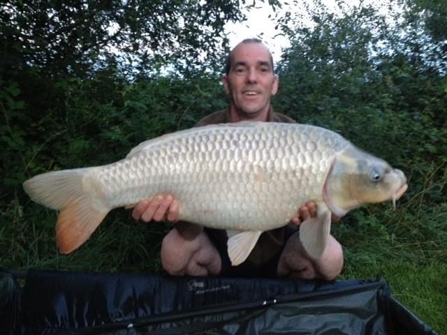 Gary Hewes With a Ghost Common Carp