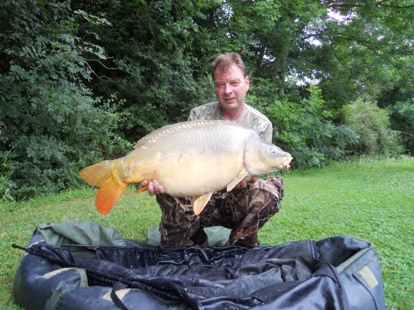 Mick Haynes with one of his 30lb carp