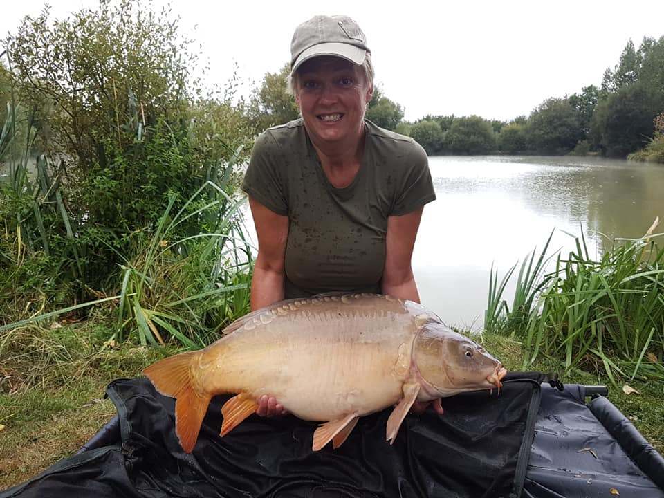 Terri Morgan with a 37lb carp caught after the netting