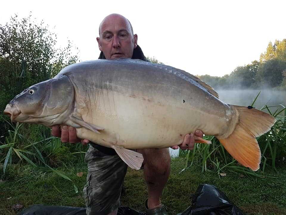 Waine Morgan with a 40lb carp caught after the netting
